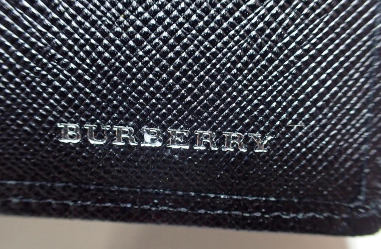 Cartera continental Burberry con estampado a cuadros en relieve