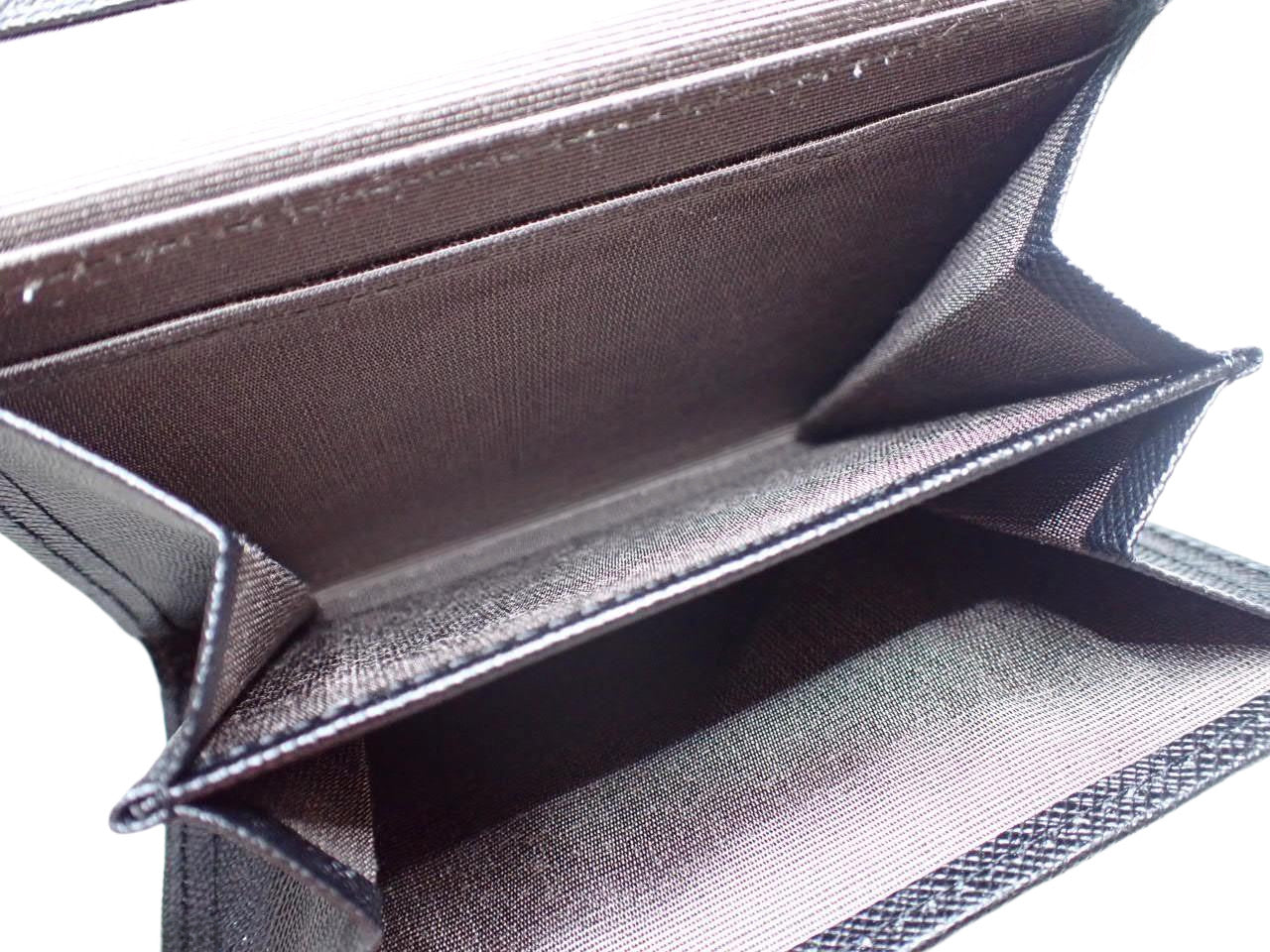 Cartera continental Burberry con estampado a cuadros en relieve